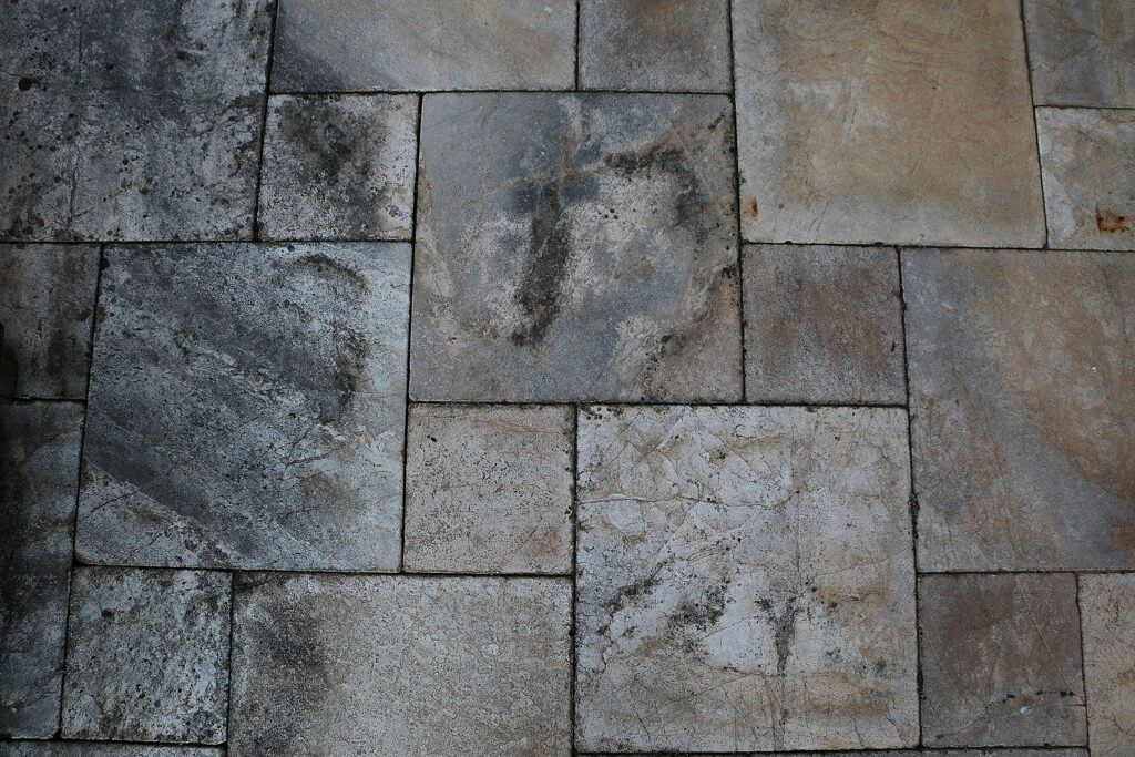 A closeup of silver travertine stone tiles